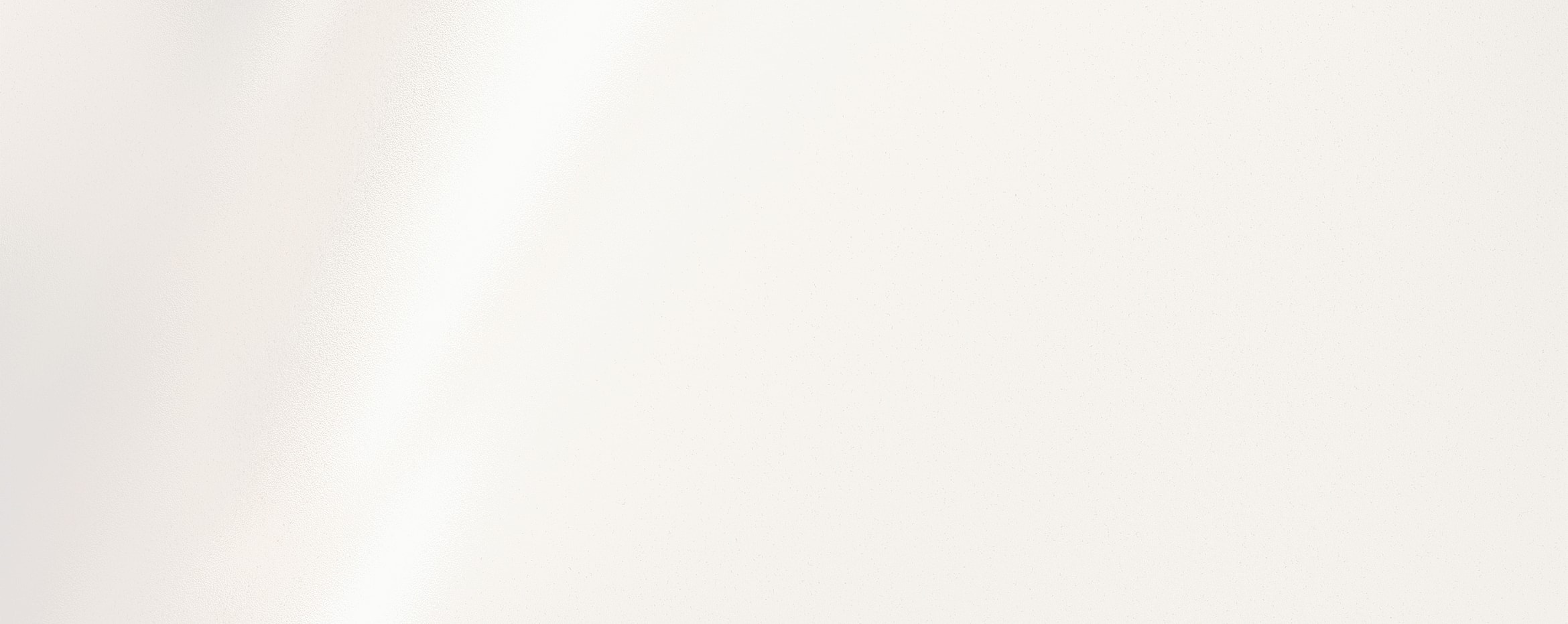 Smooth white surface with subtle texture.