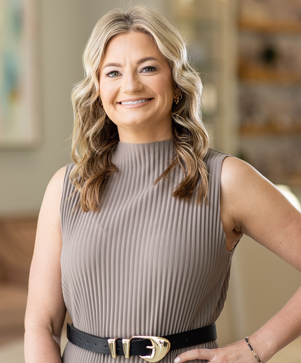 Healthcare professional smiling in stylish uniform.