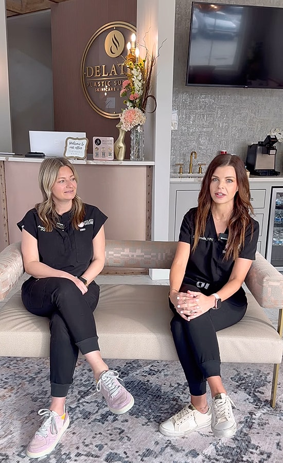 Two professionals in a modern clinic setting.