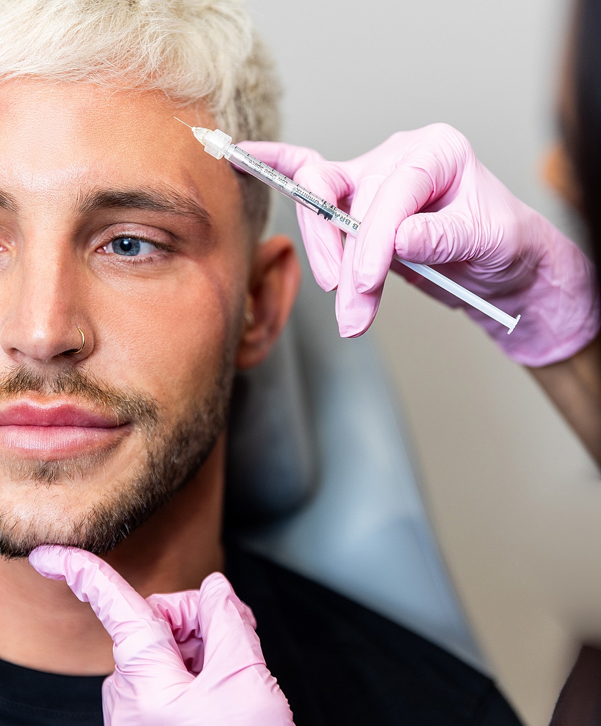 Lafayette Dysport for Men model receiving cosmetic injection in a clinic.