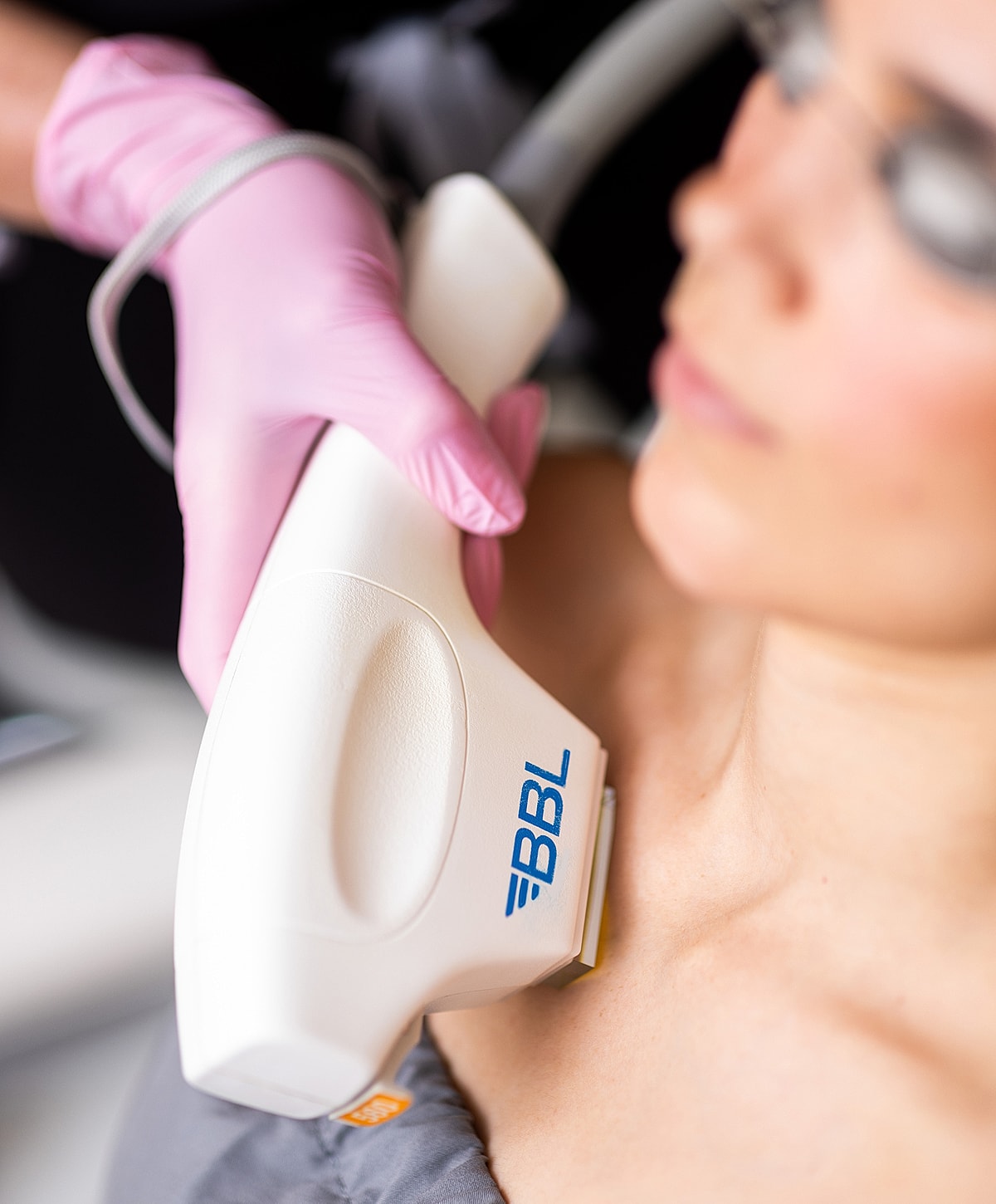 Black lace-trimmed bra with model's silhouette.