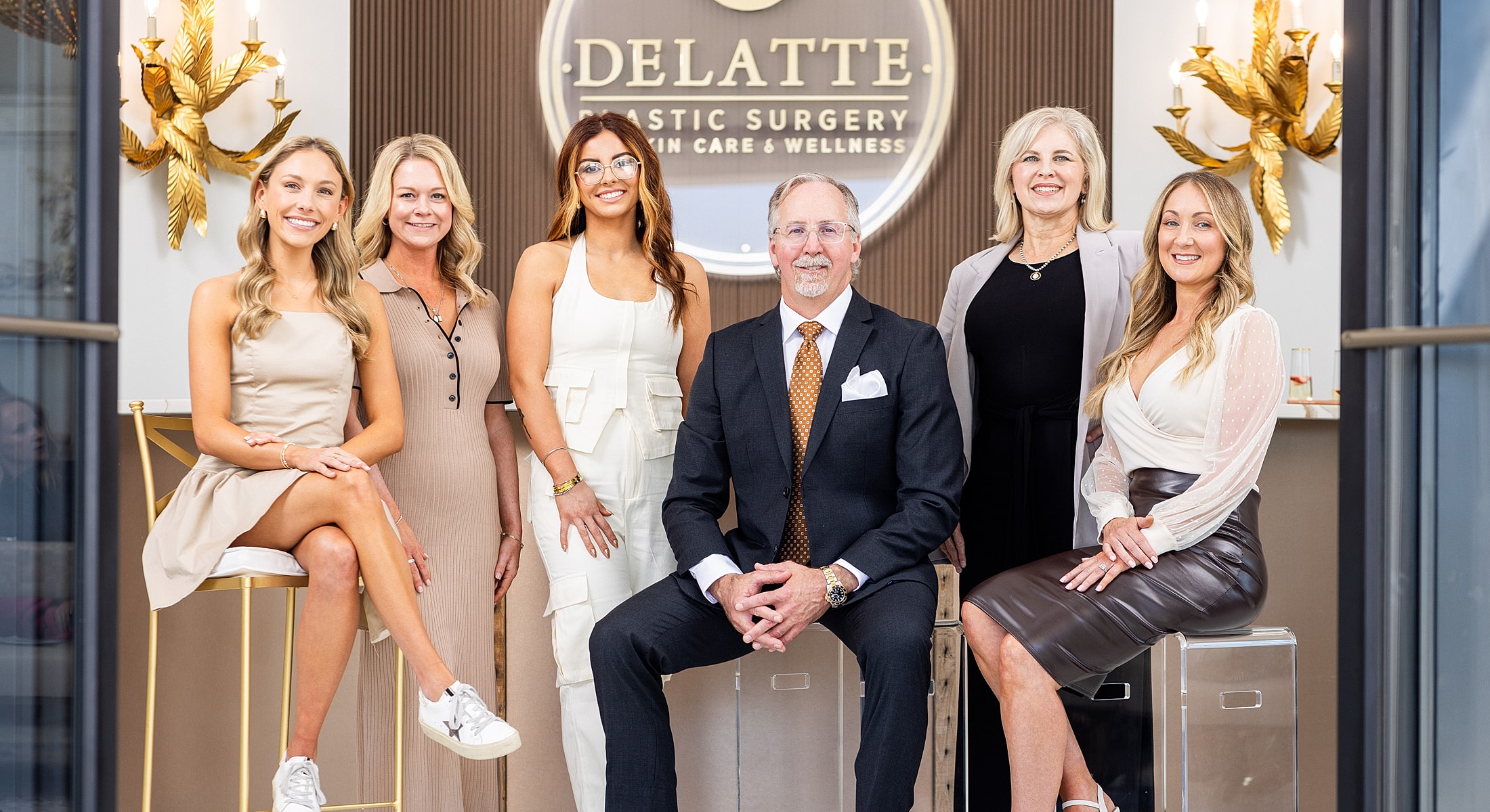 Plastic surgeons in an elegant clinic setting.