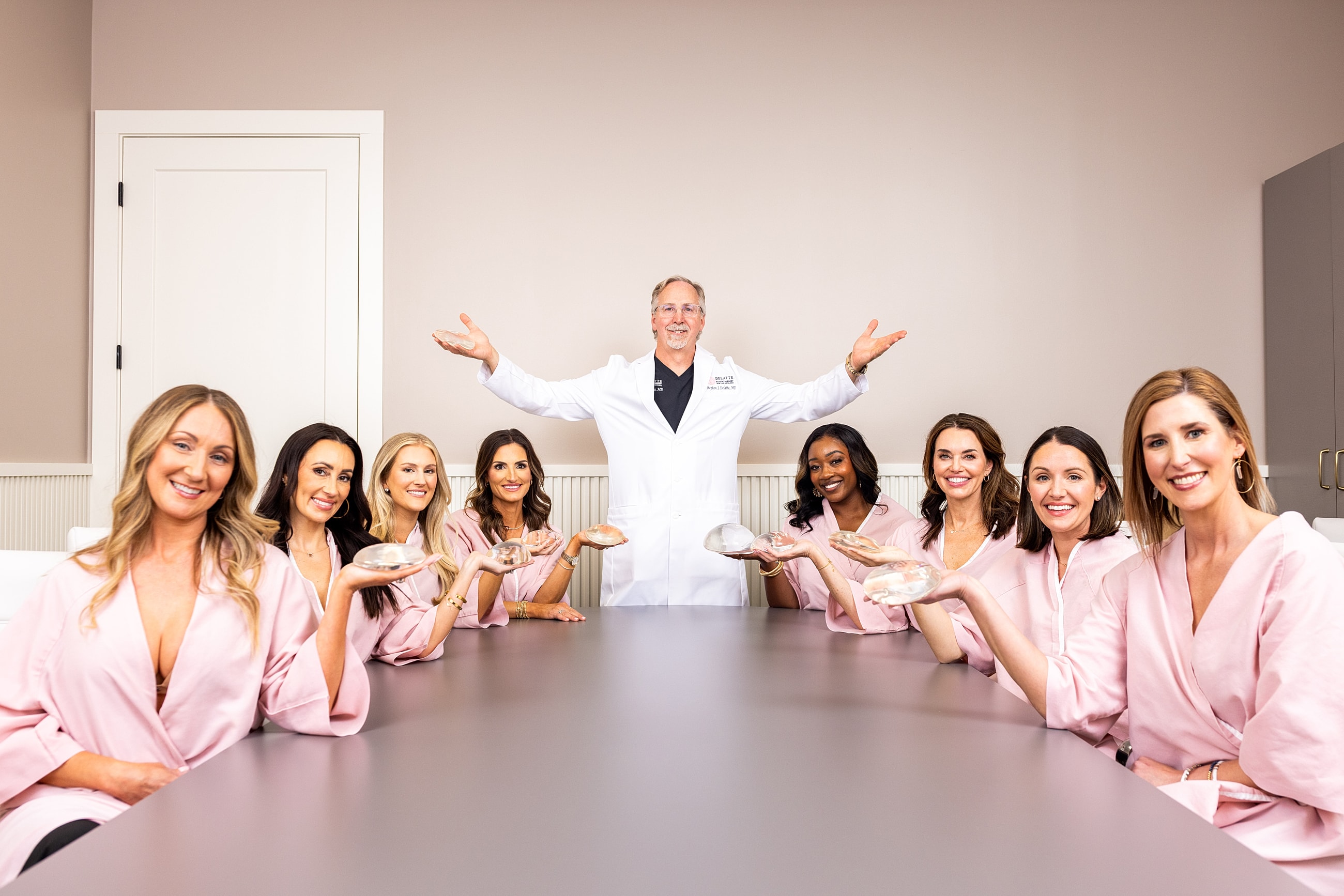 Delatte Plastic Surgery team posing for photo.