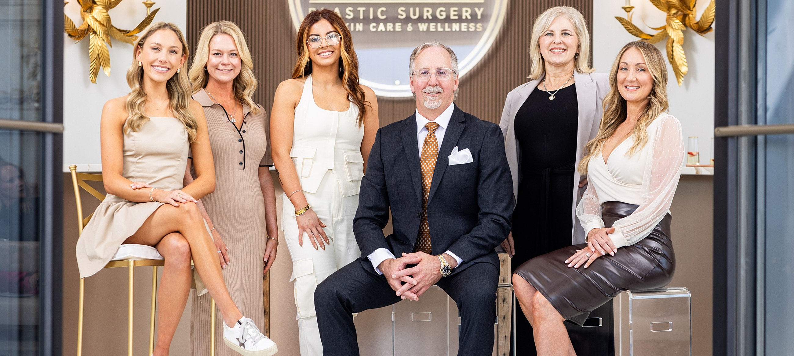 Group of professionals in a modern clinic setting.